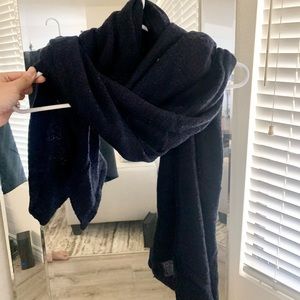 Dark navy sweater-like material long scarf.